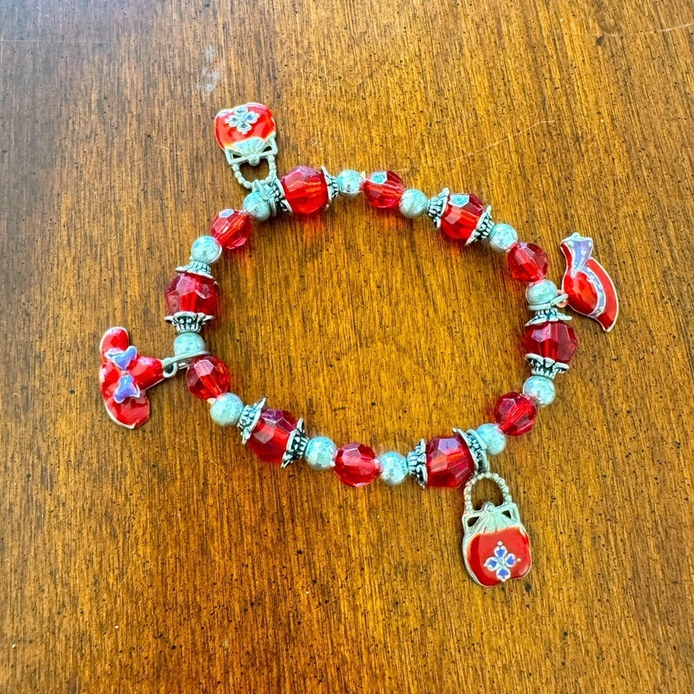 Red and silver charm bracelet